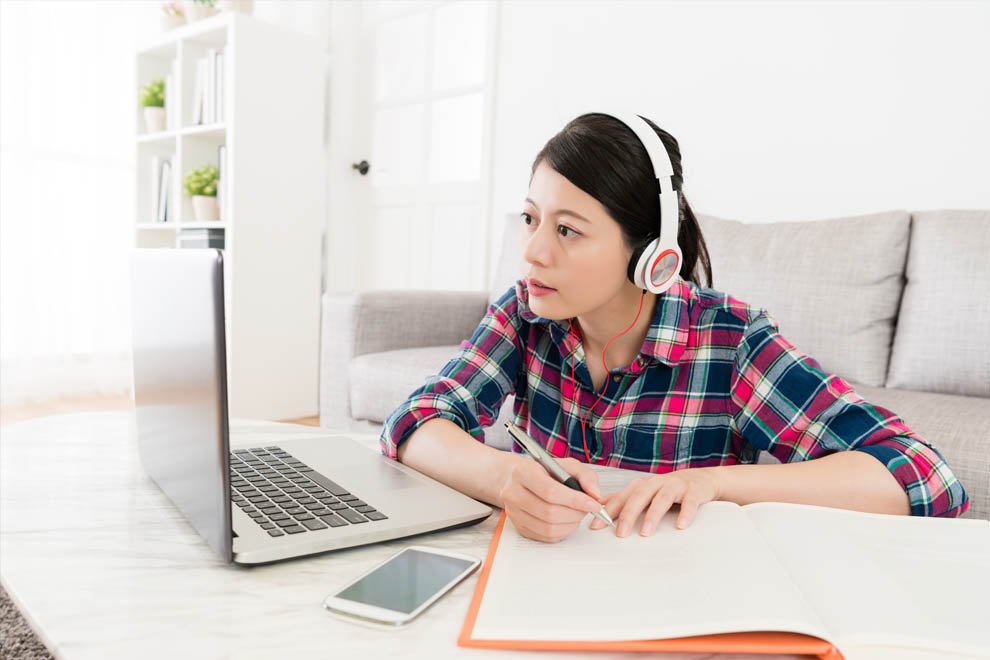 magnifying glass. comparison assessment and analysis. loupe on layered blue paper background.
